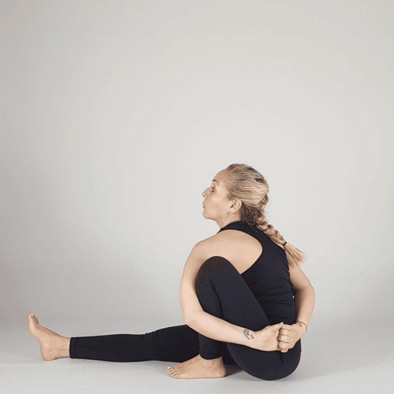 Yoga practitioner seated in butterfly pose.