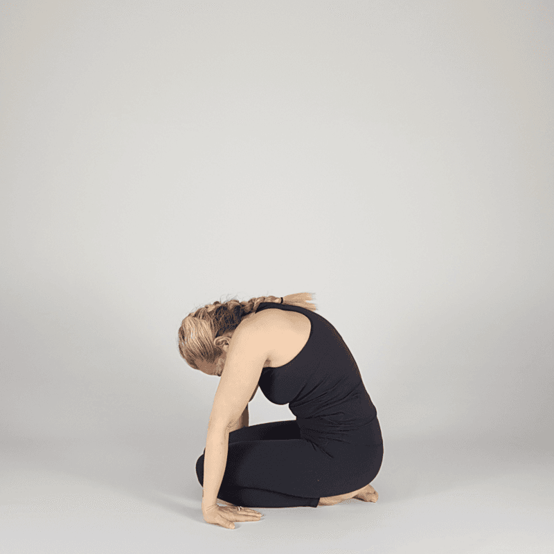 Yoga practitioner seated in meditation.