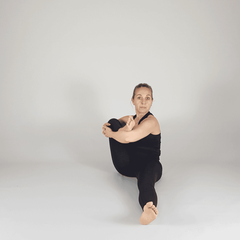 Yoga practitioner demonstrating Ardha Matsyendrasana.