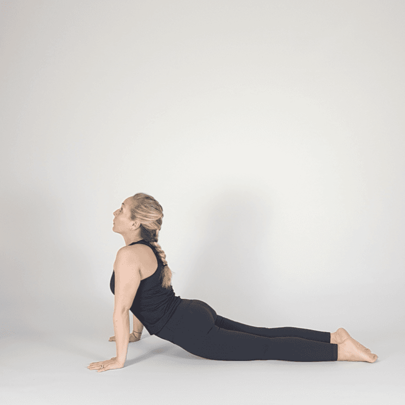 Yoga practitioner in Upward Facing Dog with chest lifted