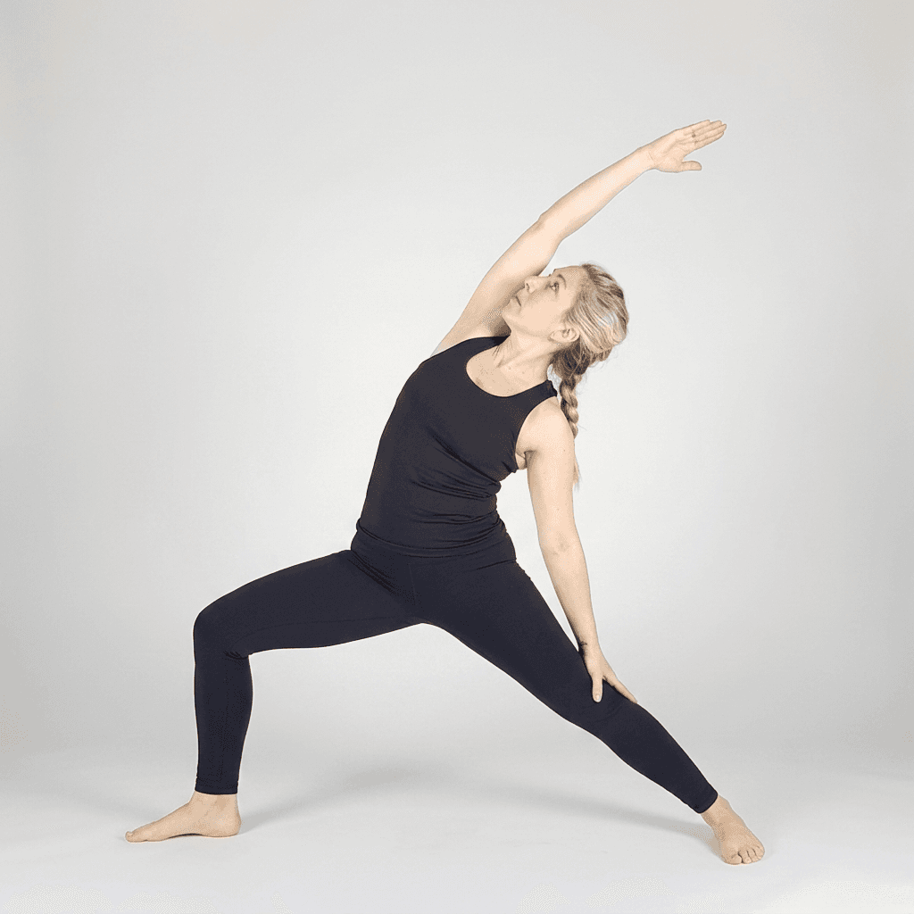 Woman demonstrating Reverse Warrior pose (Viparita Virabhadrasana)